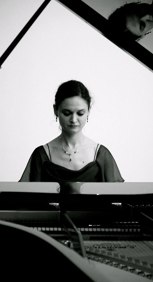 Portrait of Victoria Tzotzkova at the piano